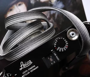 We have adopted the braiding technique known as Bamboo-gumi, which dates back to the Kamakura period and was primarily used for horse bridles (omogai). Its characteristic is that a variety of patterns can be created through different combinations of the braided cords. It's a flat, soft camera strap. The ring conection part is sewing with the leather，it is best to match the color you prefer with the leather you are making the Kumihimo with.