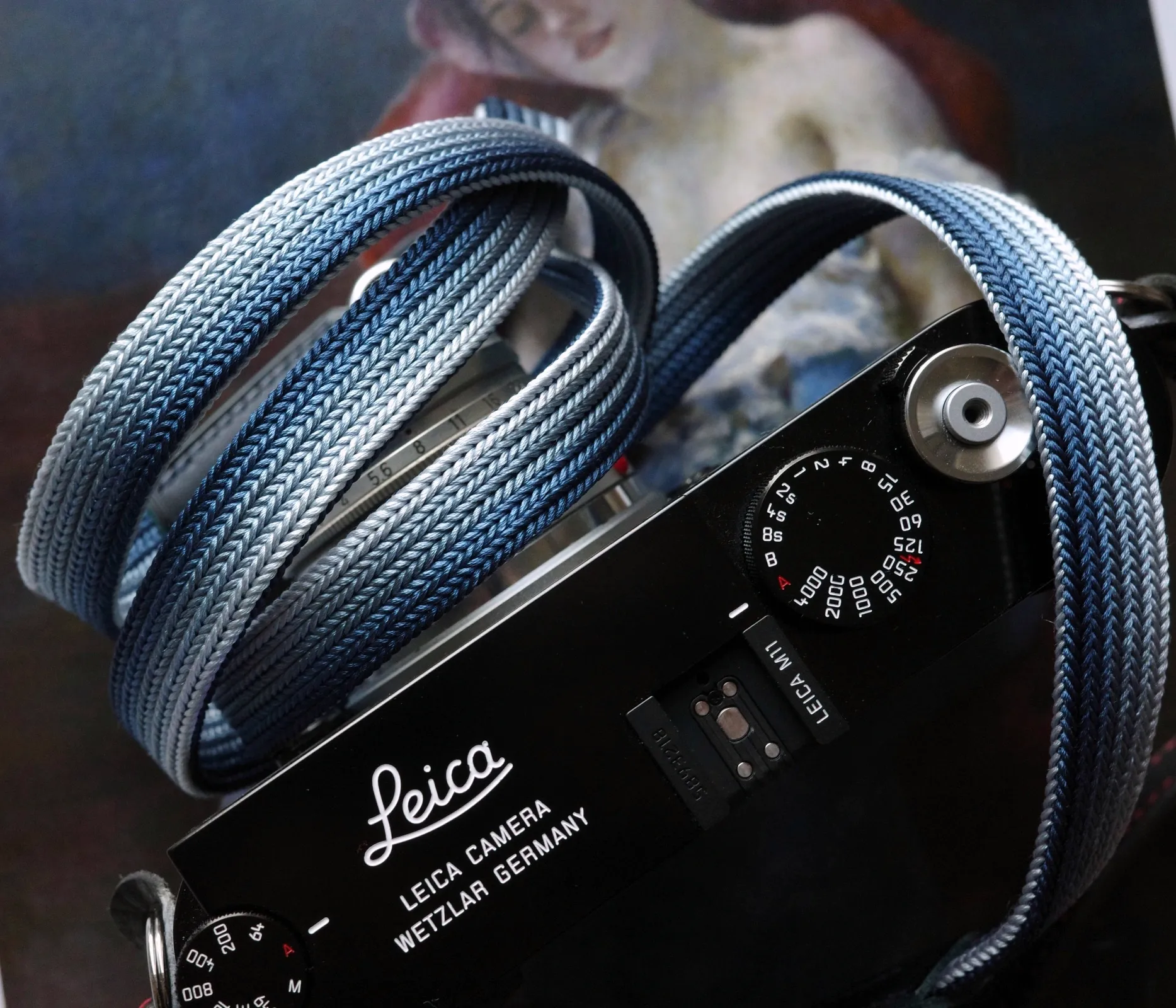 Bamboo Royal Blue is a handmade camera neck strap made with Japanese kumihimo silk and genuine leather. Comfortable, durable, and ideal for premium cameras.