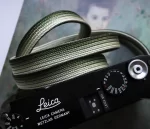 Bamboo Safari is a handmade camera neck strap made with Japanese kumihimo silk and genuine leather. Comfortable, durable, and ideal for premium cameras.