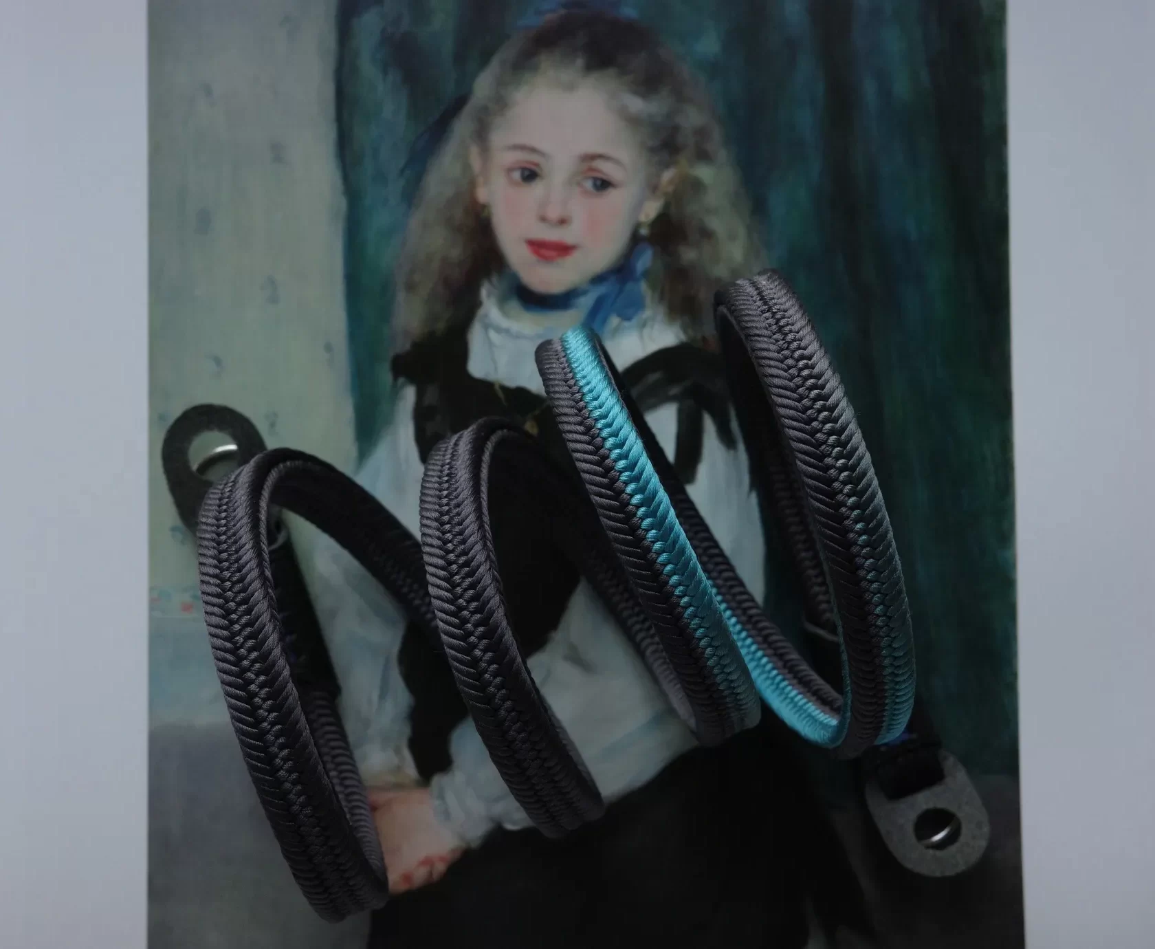 Crown Lividity Blue is a handmade camera neck strap made with Japanese kumihimo silk and genuine leather. Comfortable, durable, and ideal for premium cameras.