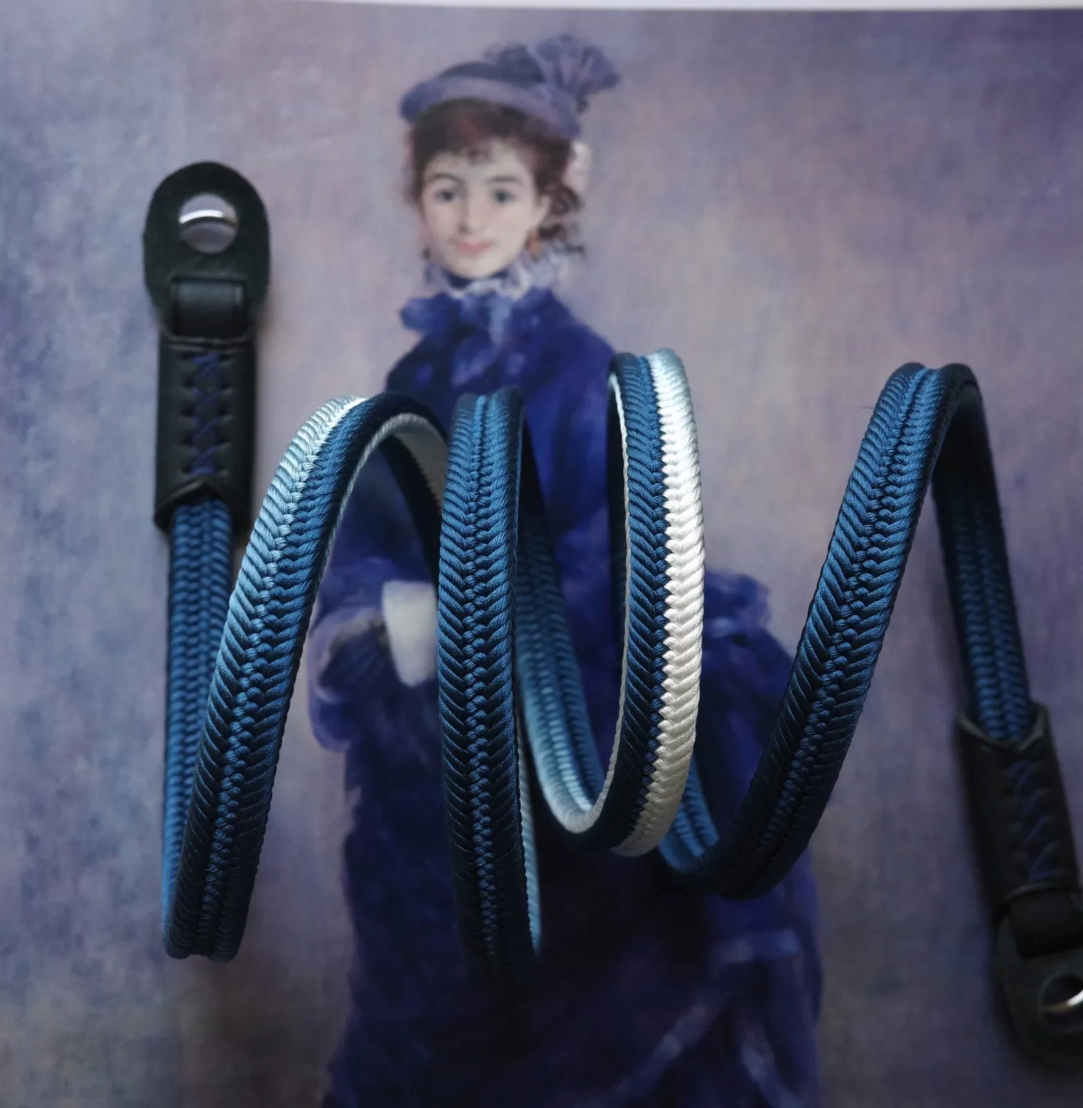 Crown Royal Blue is a handmade camera neck strap made with Japanese kumihimo silk and genuine leather. Comfortable, durable, and ideal for premium cameras.