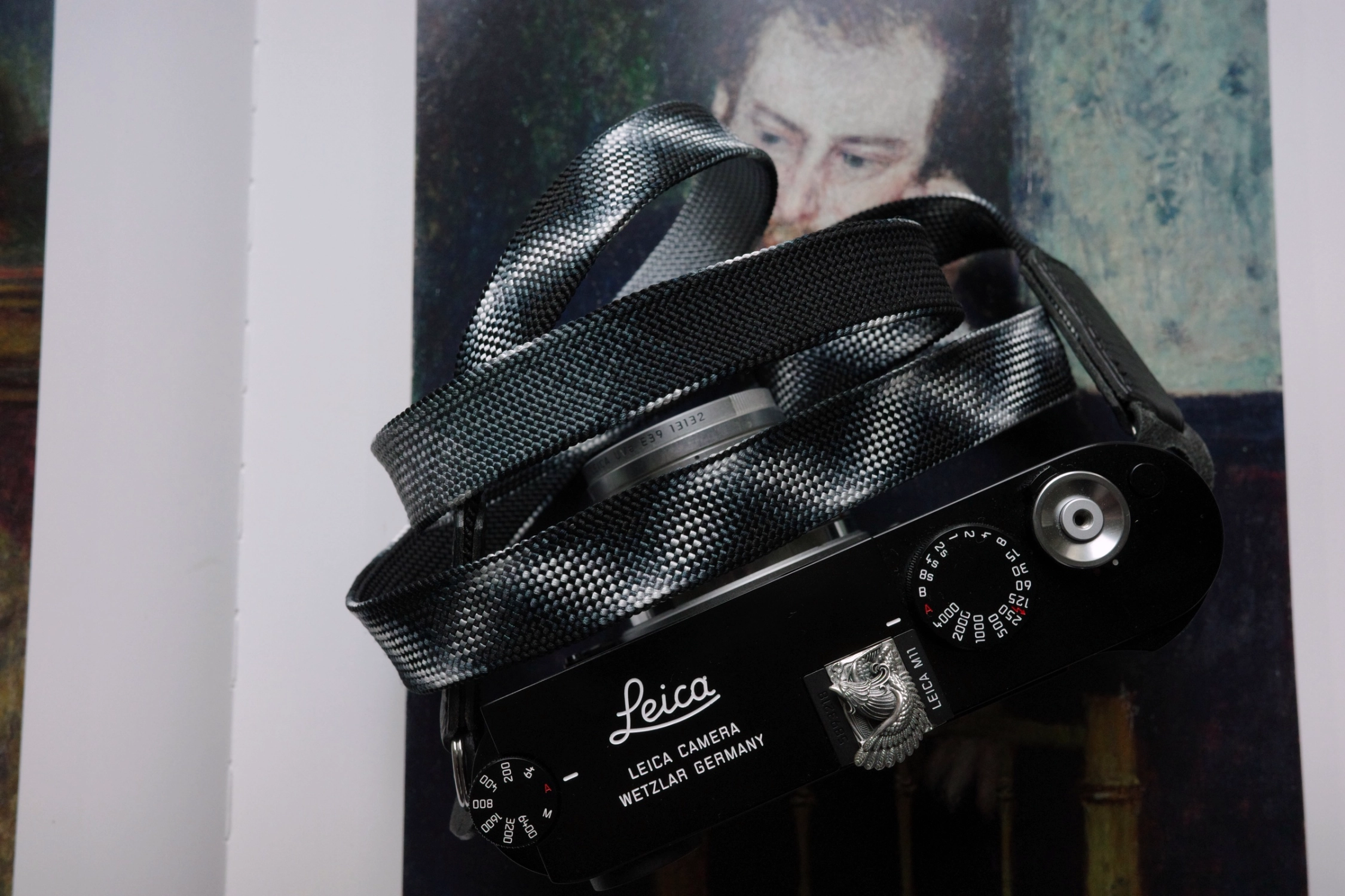 Discover the Black Samurai camera strap designed for Leica M11 Glossy Black Paint. Hand-braided using traditional Japanese Kumihimo, this premium strap blends craftsmanship, comfort, and timeless design inspired by samurai aesthetics.